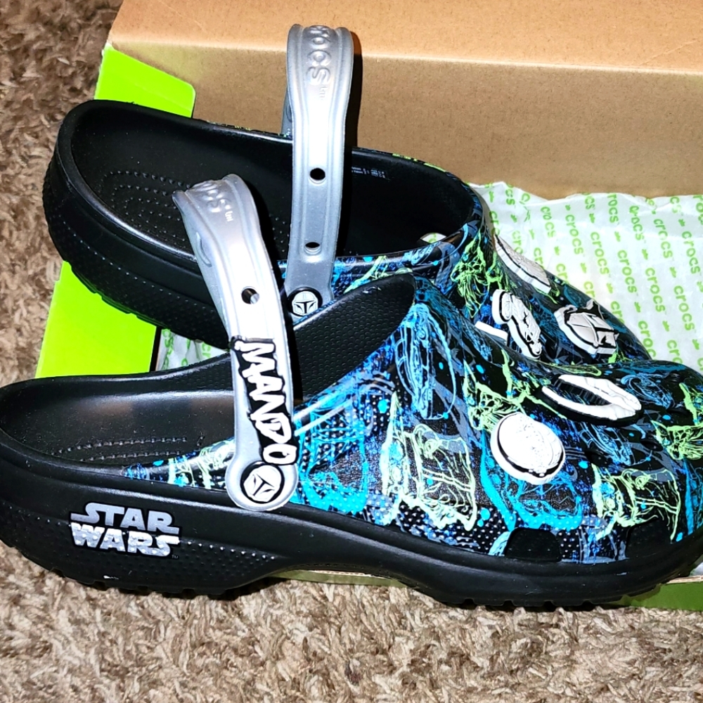 Brand new pair of mandalorian Crocs.